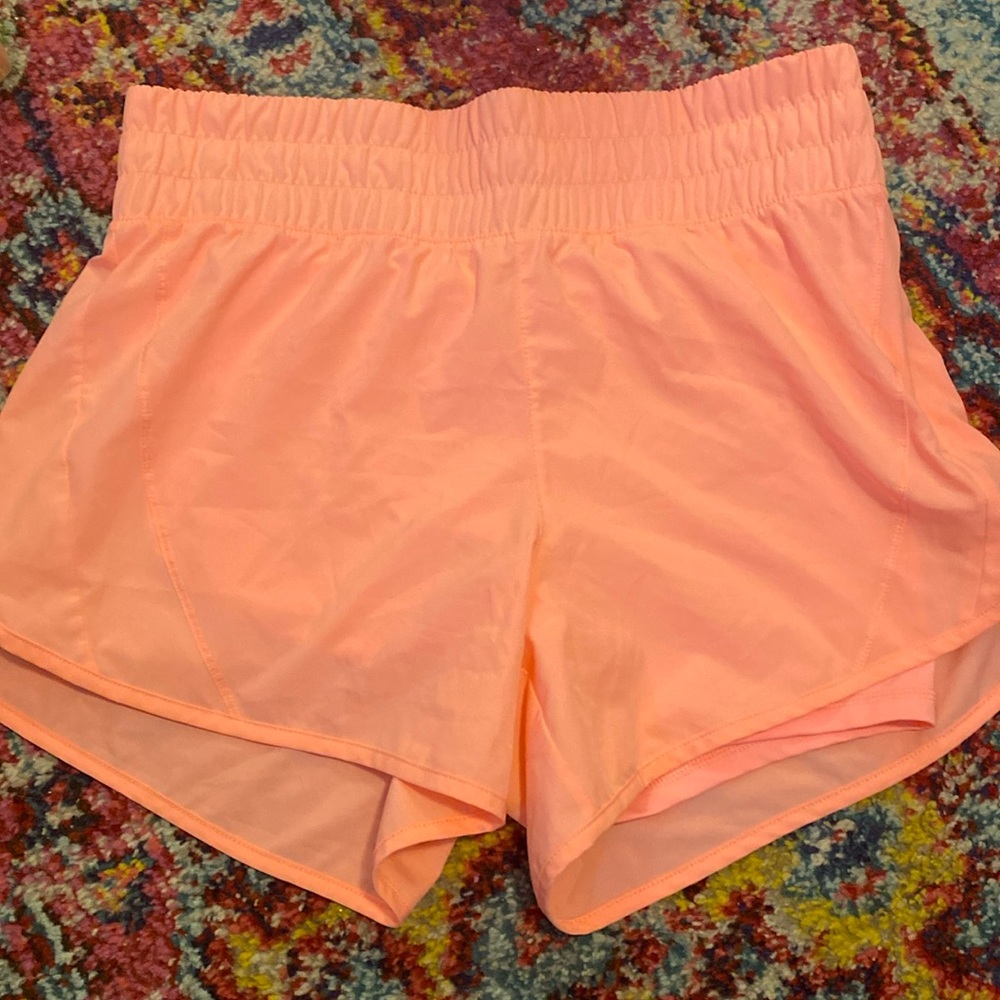 Pink shorts.